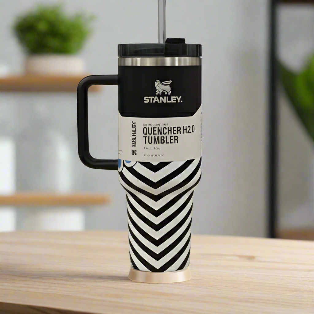 Stanley tumbler with black and white chevron pattern on a neutral background