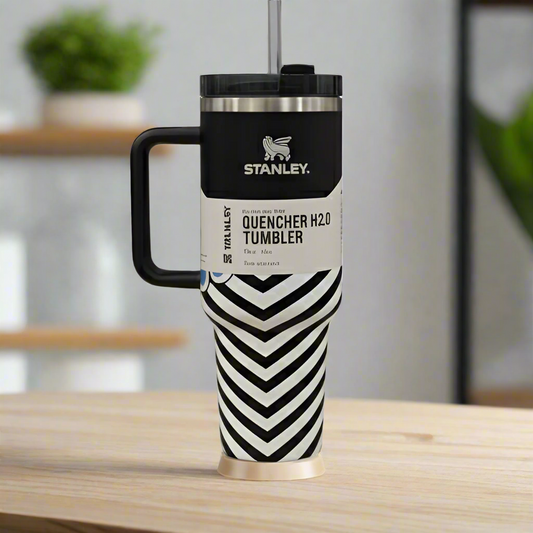 Stanley tumbler with black and white chevron pattern on a neutral background